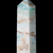 Pistachio Calcite obelisk 118mm 258g in sunlight - Rocks and Things Store