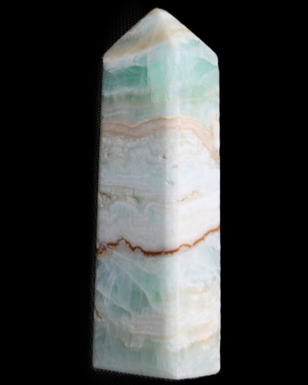Pistachio Calcite obelisk 118mm 258g in sunlight - Rocks and Things Store