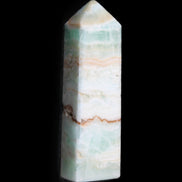 Pistachio Calcite obelisk 118mm 258g in sunlight - Rocks and Things Store