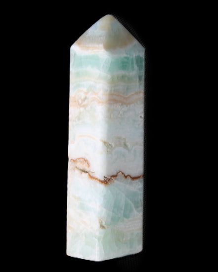 Pistachio Calcite obelisk 118mm 258g in sunlight - Rocks and Things Store
