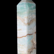 Pistachio Calcite obelisk 118mm 258g in sunlight - Rocks and Things Store