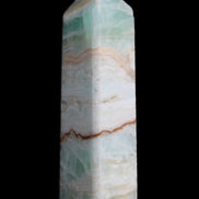 Pistachio Calcite obelisk 118mm 258g in sunlight - Rocks and Things Store