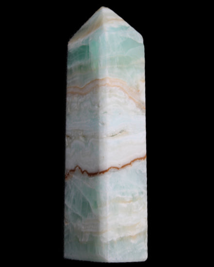 Pistachio Calcite obelisk 118mm 258g in sunlight - Rocks and Things Store