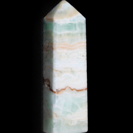 Pistachio Calcite obelisk 118mm 258g in sunlight - Rocks and Things Store