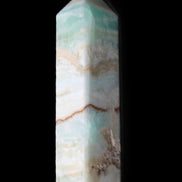 Pistachio Calcite obelisk 118mm 258g in sunlight - Rocks and Things Store