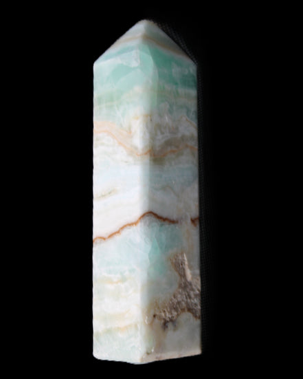 Pistachio Calcite obelisk 118mm 258g in sunlight - Rocks and Things Store