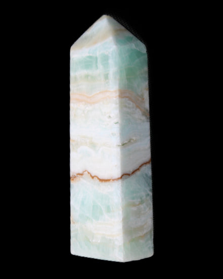 Pistachio Calcite obelisk 118mm 258g in sunlight - Rocks and Things Store