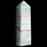 Pistachio Calcite obelisk 118mm 258g in sunlight - Rocks and Things Store