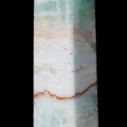Pistachio Calcite obelisk 118mm 258g in sunlight - Rocks and Things Store
