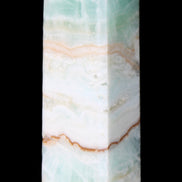 Pistachio Calcite obelisk 118mm 258g in sunlight - Rocks and Things Store