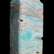 Caribbean Calcite Blue Aragonite obelisk 75*26mm 125g in sunlight - Rocks and Things Store