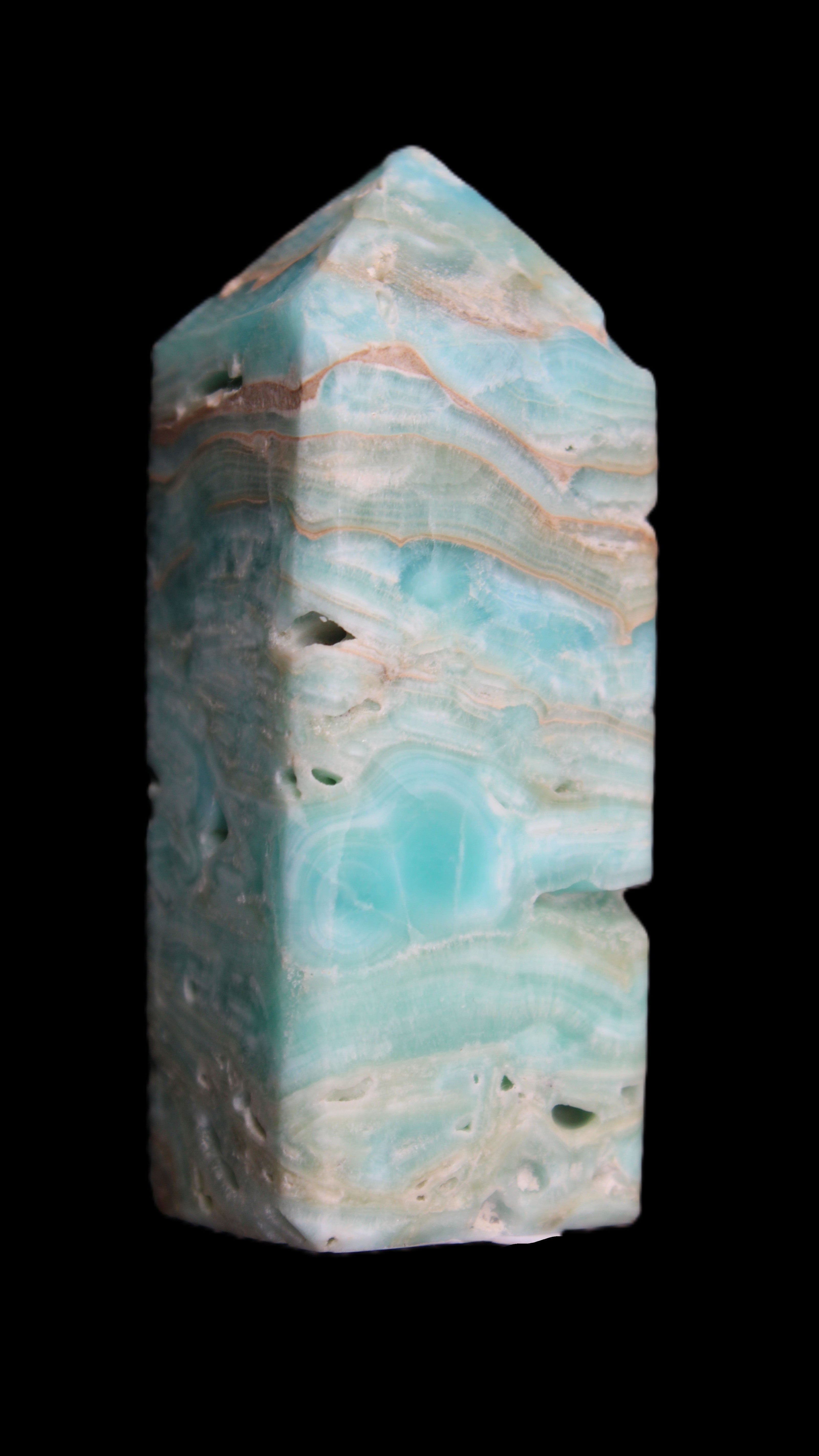 Caribbean Calcite Blue Aragonite obelisk 75*26mm 125g in sunlight - Rocks and Things Store