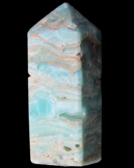 Caribbean Calcite Blue Aragonite obelisk 75*26mm 125g in sunlight - Rocks and Things Store