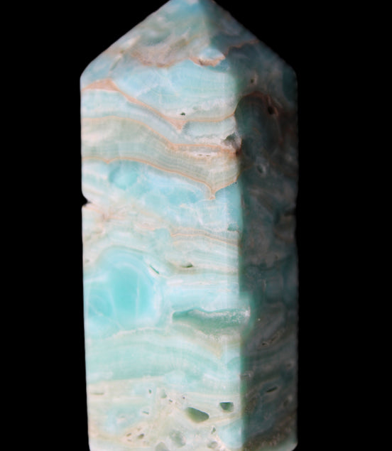 Caribbean Calcite Blue Aragonite obelisk 75*26mm 125g in sunlight - Rocks and Things Store