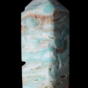 Caribbean Calcite Blue Aragonite obelisk 75*26mm 125g in sunlight - Rocks and Things Store
