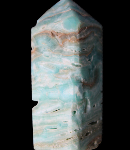 Caribbean Calcite Blue Aragonite obelisk 75*26mm 125g in sunlight - Rocks and Things Store