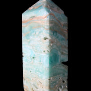 Caribbean Calcite Blue Aragonite obelisk 75*26mm 125g in sunlight - Rocks and Things Store