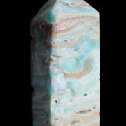 Caribbean Calcite Blue Aragonite obelisk 75*26mm 125g in sunlight - Rocks and Things Store