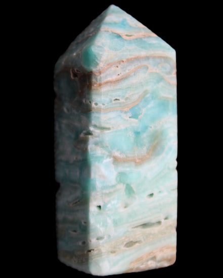 Caribbean Calcite Blue Aragonite obelisk 75*26mm 125g in sunlight - Rocks and Things Store