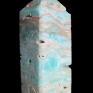 Caribbean Calcite Blue Aragonite obelisk 75*26mm 125g in sunlight - Rocks and Things Store
