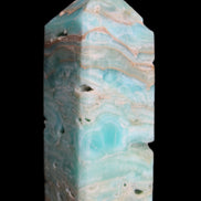 Caribbean Calcite Blue Aragonite obelisk 75*26mm 125g in sunlight - Rocks and Things Store