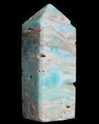 Caribbean Calcite Blue Aragonite obelisk 75*26mm 125g in sunlight - Rocks and Things Store