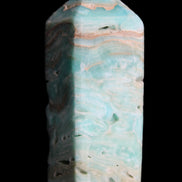 Caribbean Calcite Blue Aragonite obelisk 75*26mm 125g in sunlight - Rocks and Things Store
