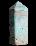Caribbean Calcite Blue Aragonite obelisk 75*26mm 125g in sunlight - Rocks and Things Store