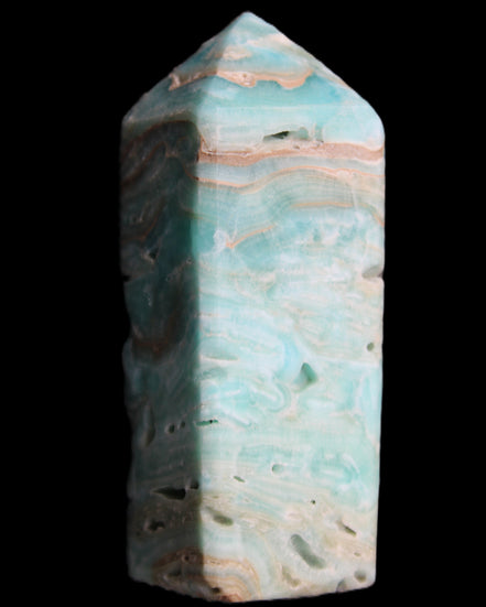 Caribbean Calcite Blue Aragonite obelisk 75*26mm 125g in sunlight - Rocks and Things Store