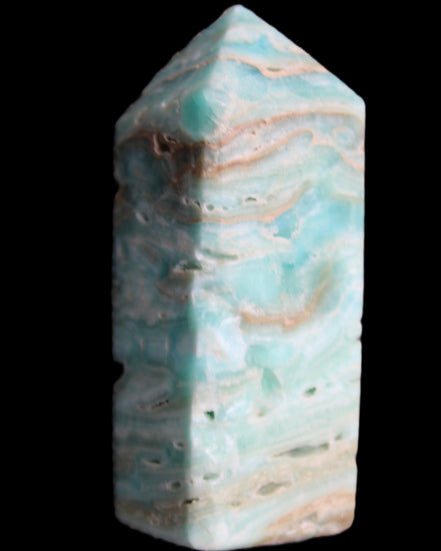 Caribbean Calcite Blue Aragonite obelisk 75*26mm 125g in sunlight - Rocks and Things Store