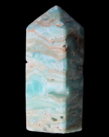 Caribbean Calcite Blue Aragonite obelisk 75*26mm 125g in sunlight - Rocks and Things Store