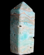 Caribbean Calcite Blue Aragonite obelisk 75*26mm 125g in sunlight - Rocks and Things Store