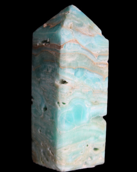 Caribbean Calcite Blue Aragonite obelisk 75*26mm 125g in sunlight - Rocks and Things Store