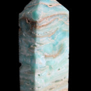 Caribbean Calcite Blue Aragonite obelisk 75*26mm 125g in sunlight - Rocks and Things Store