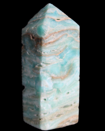 Caribbean Calcite Blue Aragonite obelisk 75*26mm 125g in sunlight - Rocks and Things Store