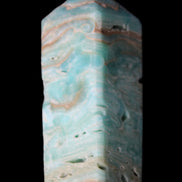 Caribbean Calcite Blue Aragonite obelisk 75*26mm 125g in sunlight - Rocks and Things Store