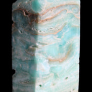 Caribbean Calcite Blue Aragonite obelisk 75*26mm 125g in sunlight - Rocks and Things Store