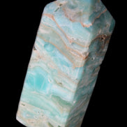 Caribbean Calcite Blue Aragonite obelisk 75*26mm 125g in sunlight - Rocks and Things Store