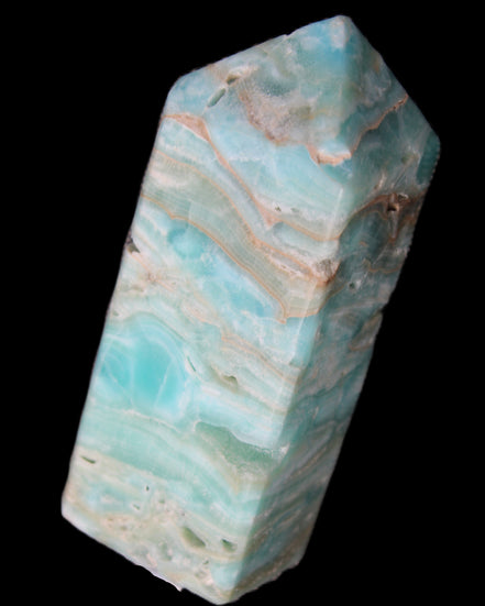 Caribbean Calcite Blue Aragonite obelisk 75*26mm 125g in sunlight - Rocks and Things Store