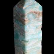 Caribbean Calcite Blue Aragonite obelisk 75*26mm 125g in sunlight - Rocks and Things Store