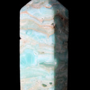 Caribbean Calcite Blue Aragonite obelisk 75*26mm 125g in sunlight - Rocks and Things Store