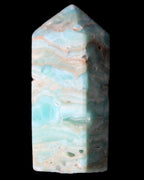 Caribbean Calcite Blue Aragonite obelisk 75*26mm 125g in sunlight - Rocks and Things Store