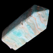Caribbean Calcite Blue Aragonite obelisk 75*26mm 125g in sunlight - Rocks and Things Store