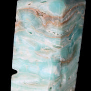 Caribbean Calcite Blue Aragonite obelisk 75*26mm 125g in sunlight - Rocks and Things Store