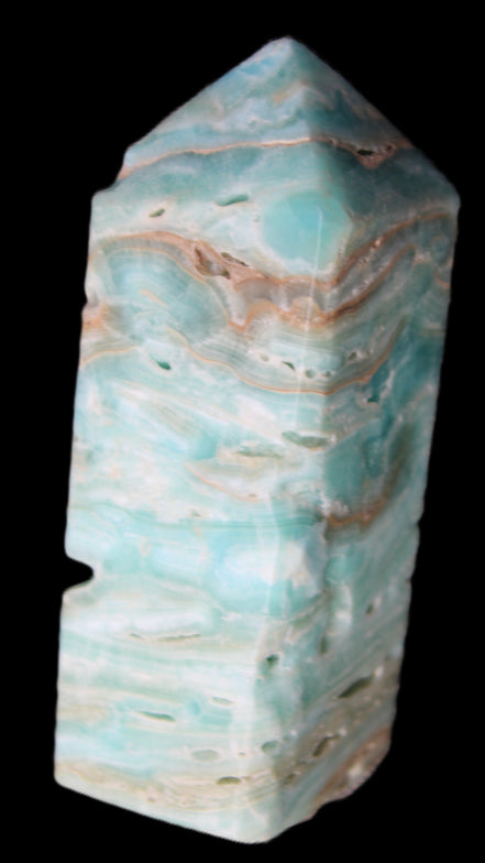 Caribbean Calcite Blue Aragonite obelisk 75*26mm 125g in sunlight - Rocks and Things Store