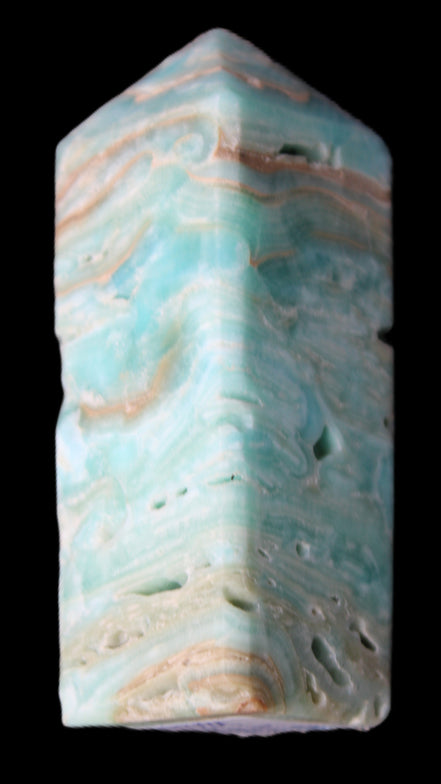 Caribbean Calcite Blue Aragonite obelisk 75*26mm 125g in sunlight - Rocks and Things Store