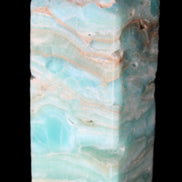 Caribbean Calcite Blue Aragonite obelisk 75*26mm 125g in sunlight - Rocks and Things Store