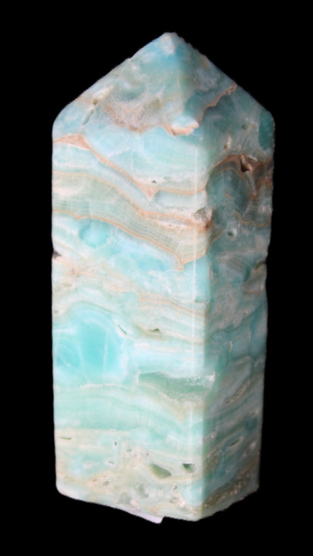 Caribbean Calcite Blue Aragonite obelisk 75*26mm 125g in sunlight - Rocks and Things Store