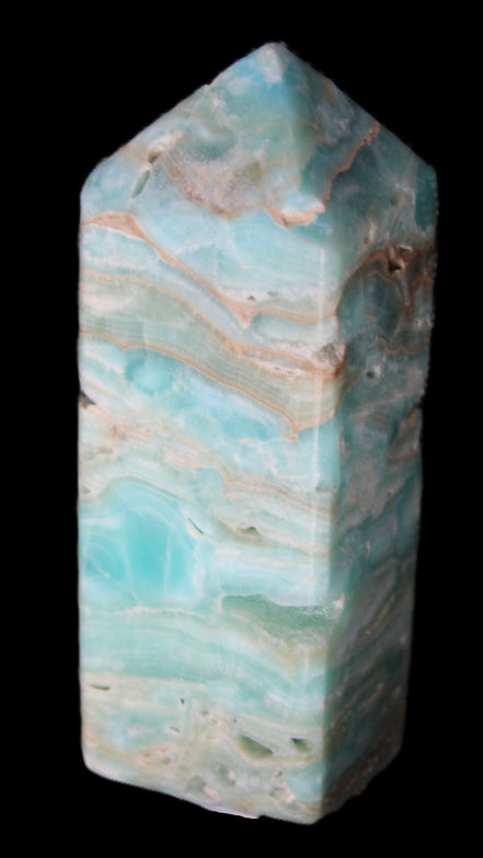 Caribbean Calcite Blue Aragonite obelisk 75*26mm 125g in sunlight - Rocks and Things Store