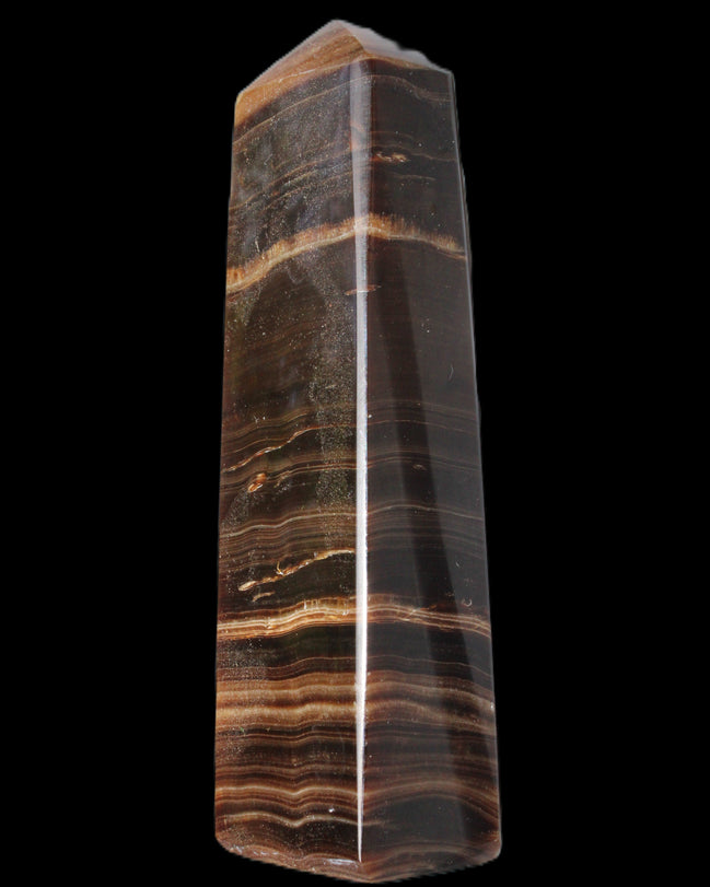 Chocolate Calcite obelisk 119*33 mm 222g in sunlight - Rocks and Things Store